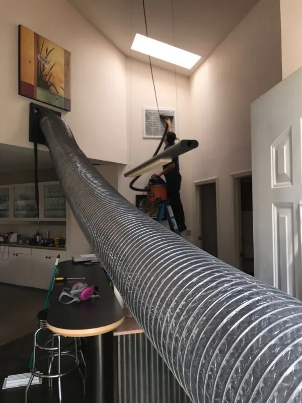 Air duct cleaning using the negative pressure method