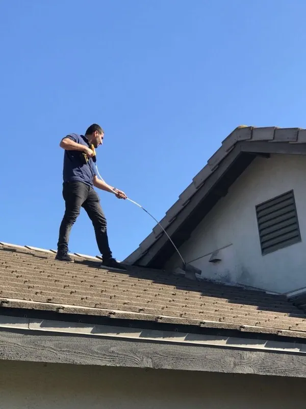 Cleaning out a rooftop dryer vent